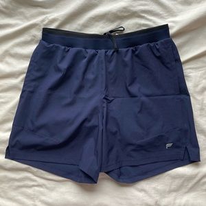 Fabletics men’s shorts with built-in spandex, navy. 5 inch inseam.